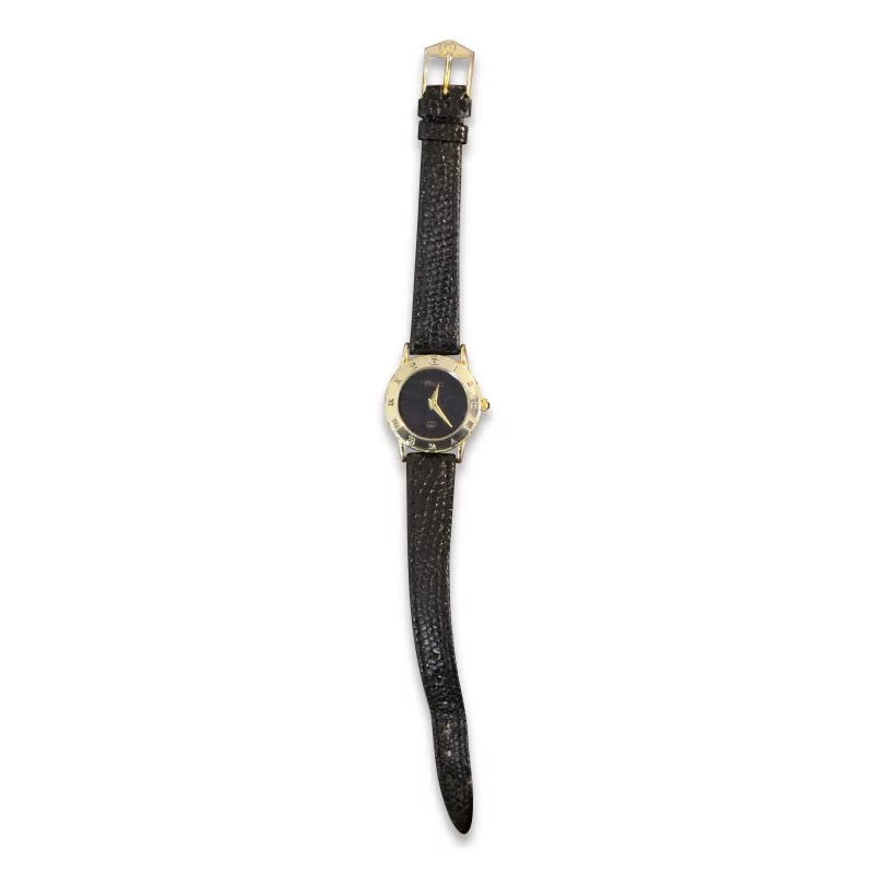 \"Gucci\"-Uhr mit goldfarbenem Gehäuse und schwarzem Lederarmband. - Moinat - Dekorationszubehör